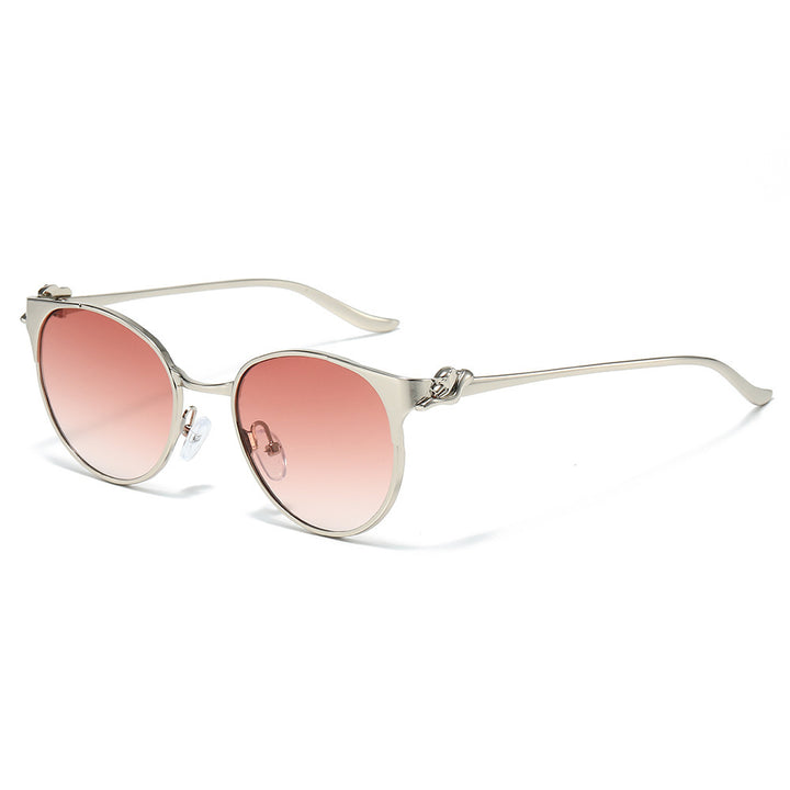 Elegant Cat-Eye Sunglasses with Decorative Gold Accents Stornfield