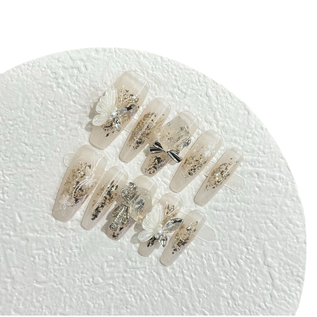 Artistic Press-On Nail Set with Butterfly and Floral Accents