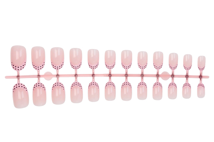 Artificial nail set with elegant tips and playful dots Stornfield