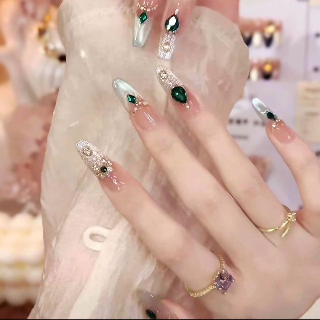 Elegant Nail Art Extensions with Pearl Accents Stornfield