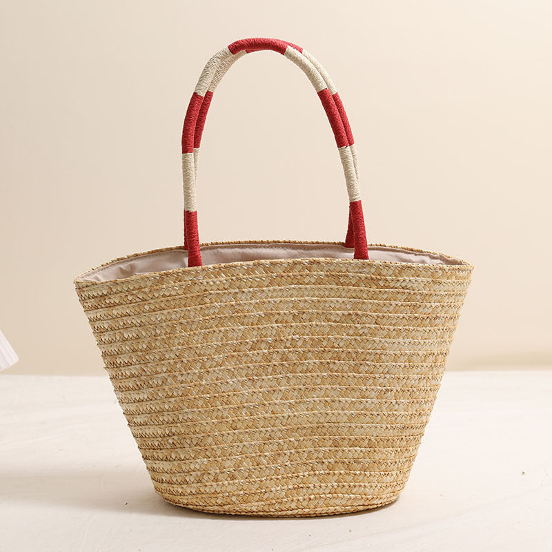 Handcrafted basket bag with vibrant floral embroidery design Stornfield