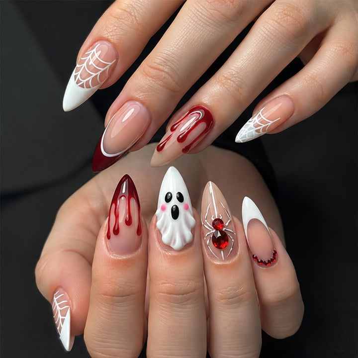 Creative nail art set with Halloween designs and glitter elements Stornfield