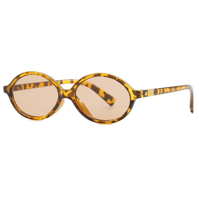 Women's fashionable sunglasses with oval frame and golden accents Stornfield