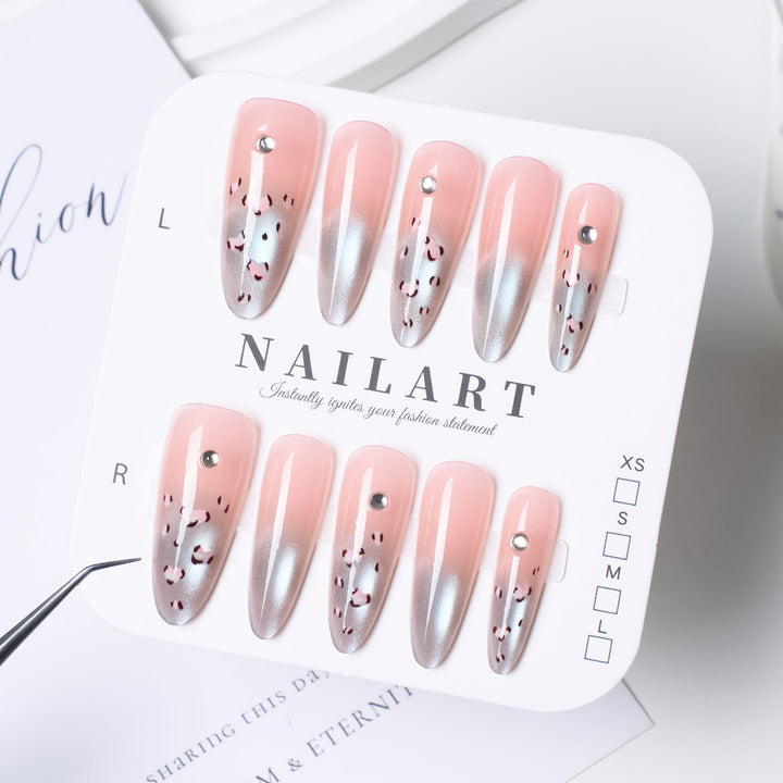Artistic Press-On Nail Design with Floral Accents Stornfield