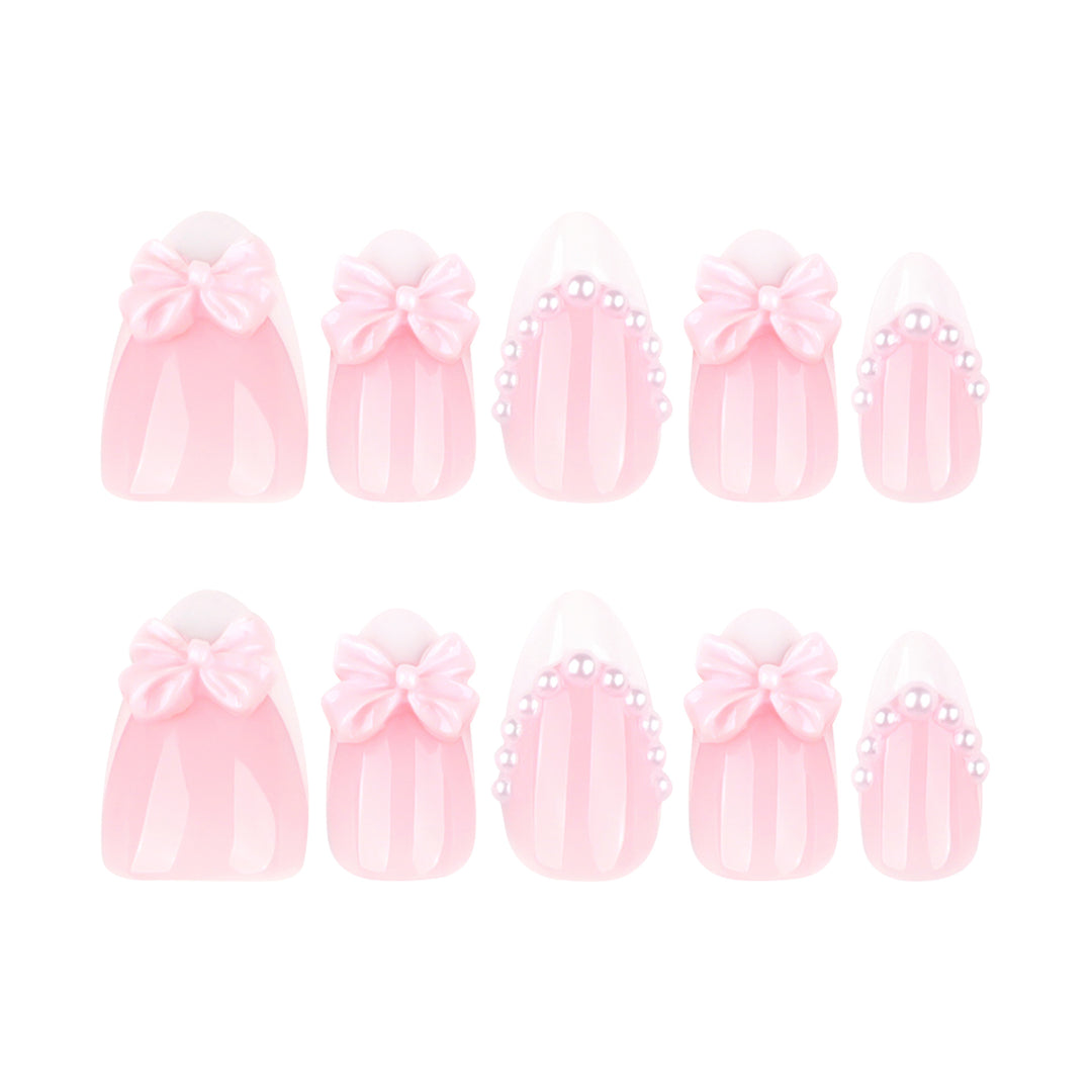 Artful Stiletto Nails with Delicate Bow Accents Stornfield