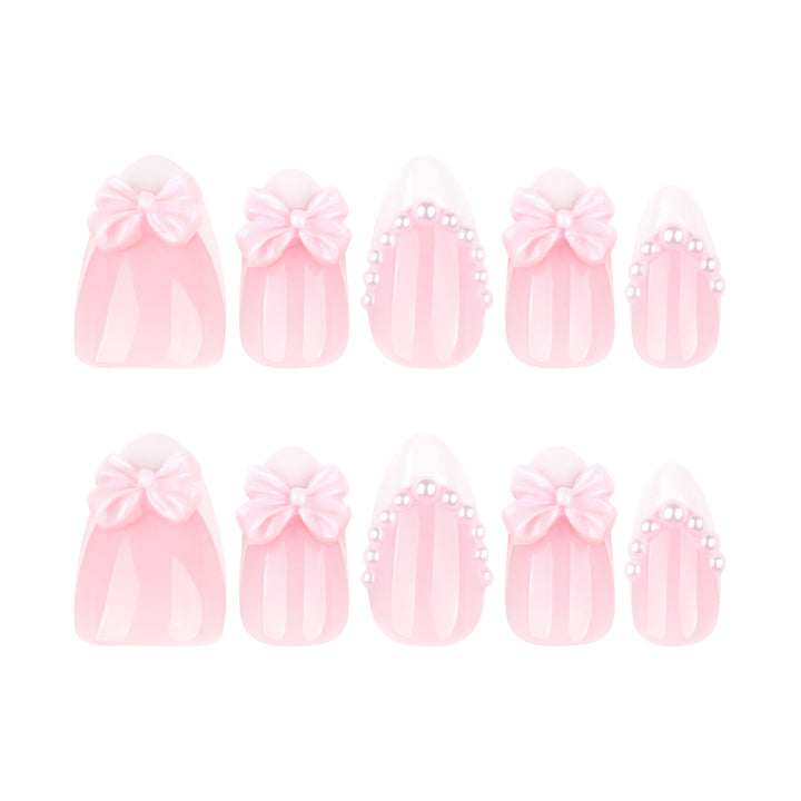 Artful Stiletto Nails with Delicate Bow Accents Stornfield