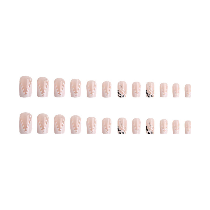 Artificial nails with elegant French design and glitter details Stornfield