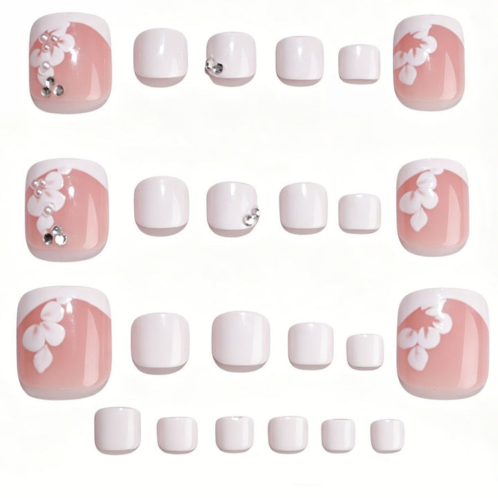 Nail art set with elegant flower design and glitter accents Stornfield