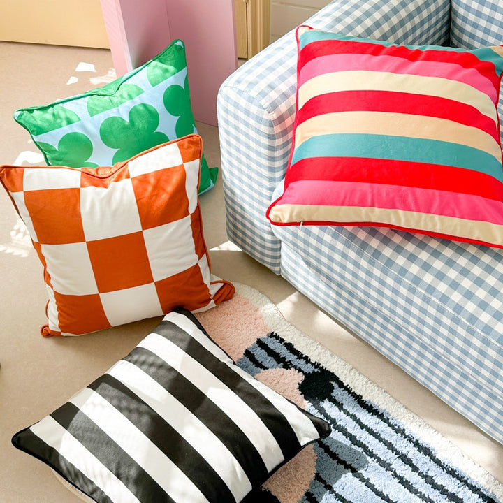 Decorative checkered cushion cover made of velvet velours with piping and concealed zipper