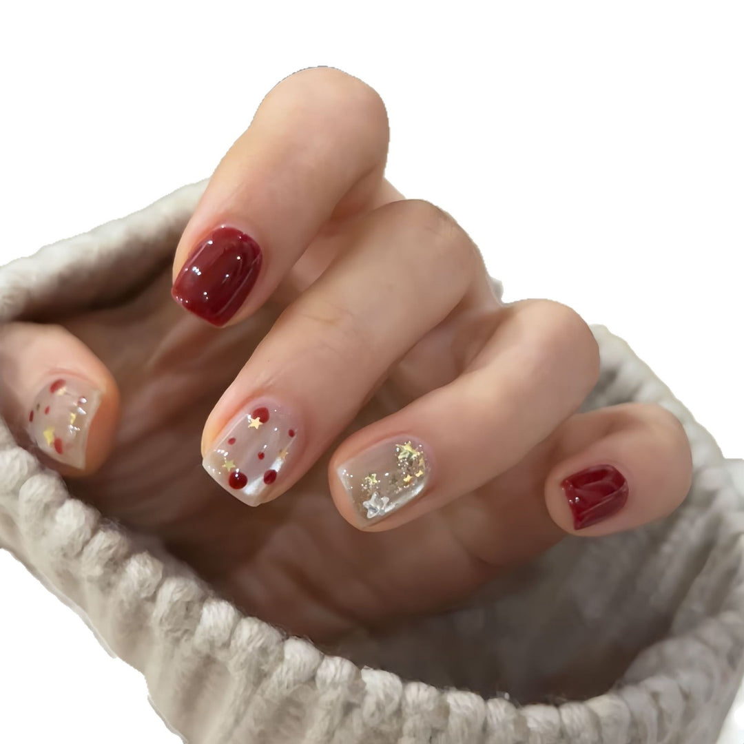 Nail set with sparkling glitter details and creative designs Stornfield
