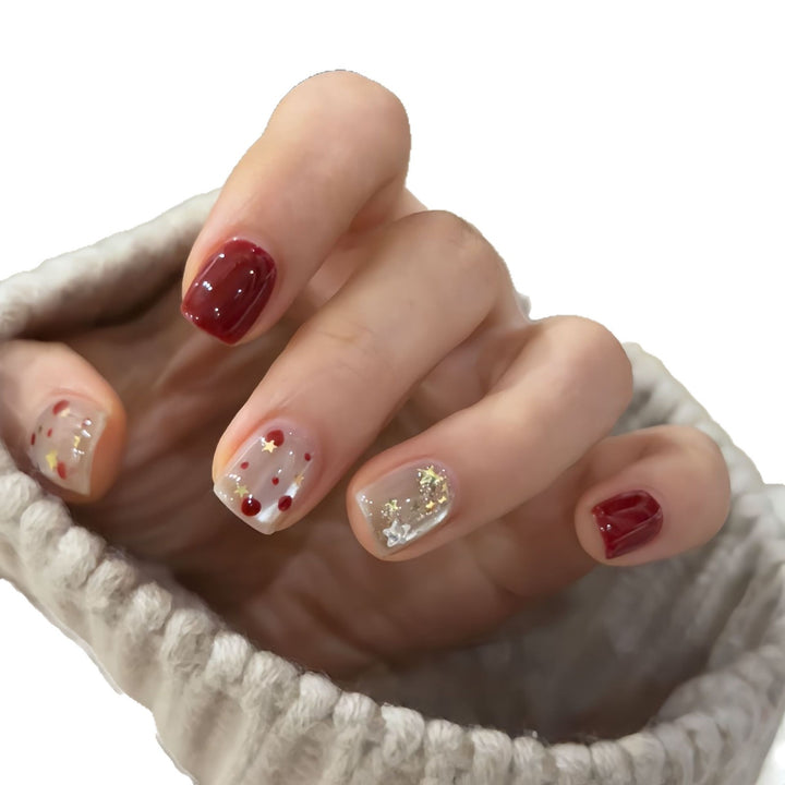 Nail set with sparkling glitter details and creative designs Stornfield