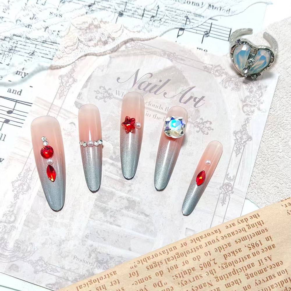 Sparkling artificial nails with decorative rhinestones Stornfield
