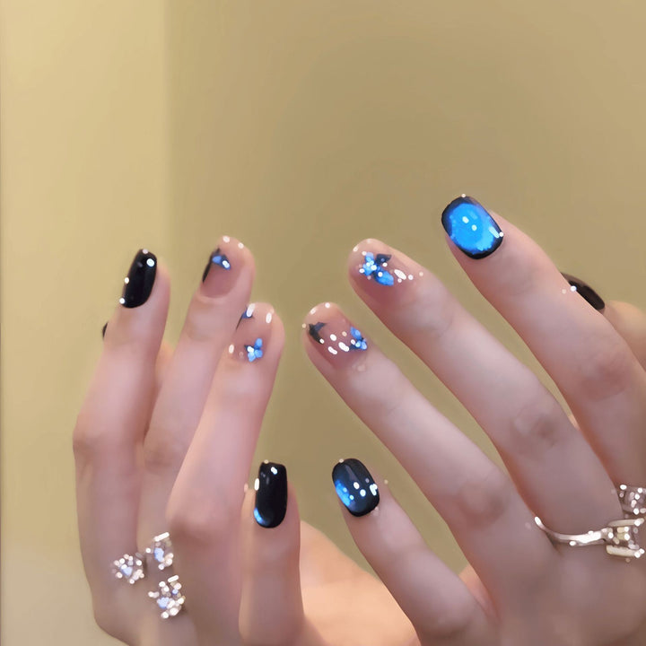 Artificial Nail Art with Glitter and Flower Designs Stornfield