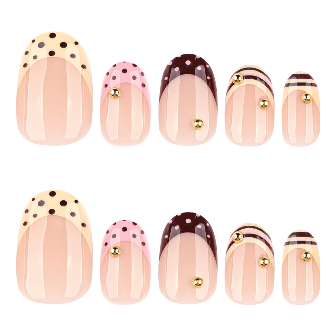 Artful stiletto nails with elegant floral design and glitter details Stornfield