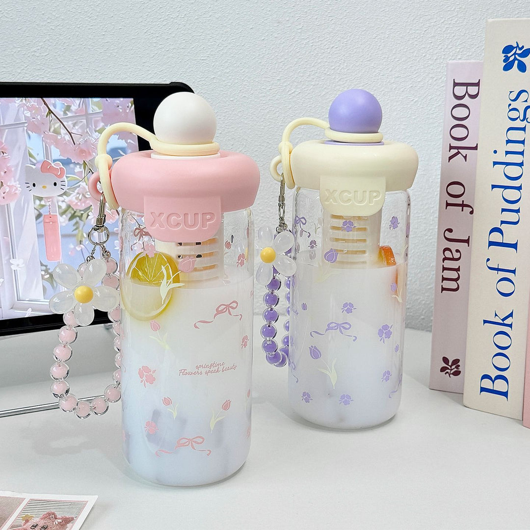 Women's bottle with integrated fruit infuser and Stornfield keychain
