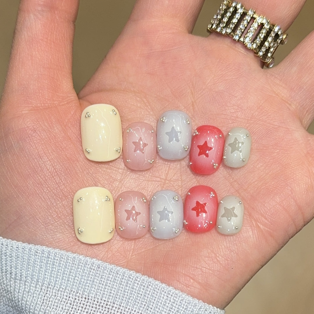 Artificial nails with sparkling star motifs Stornfield