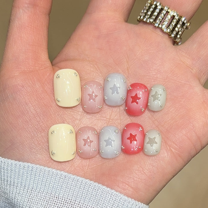 Artificial nails with sparkling star motifs Stornfield