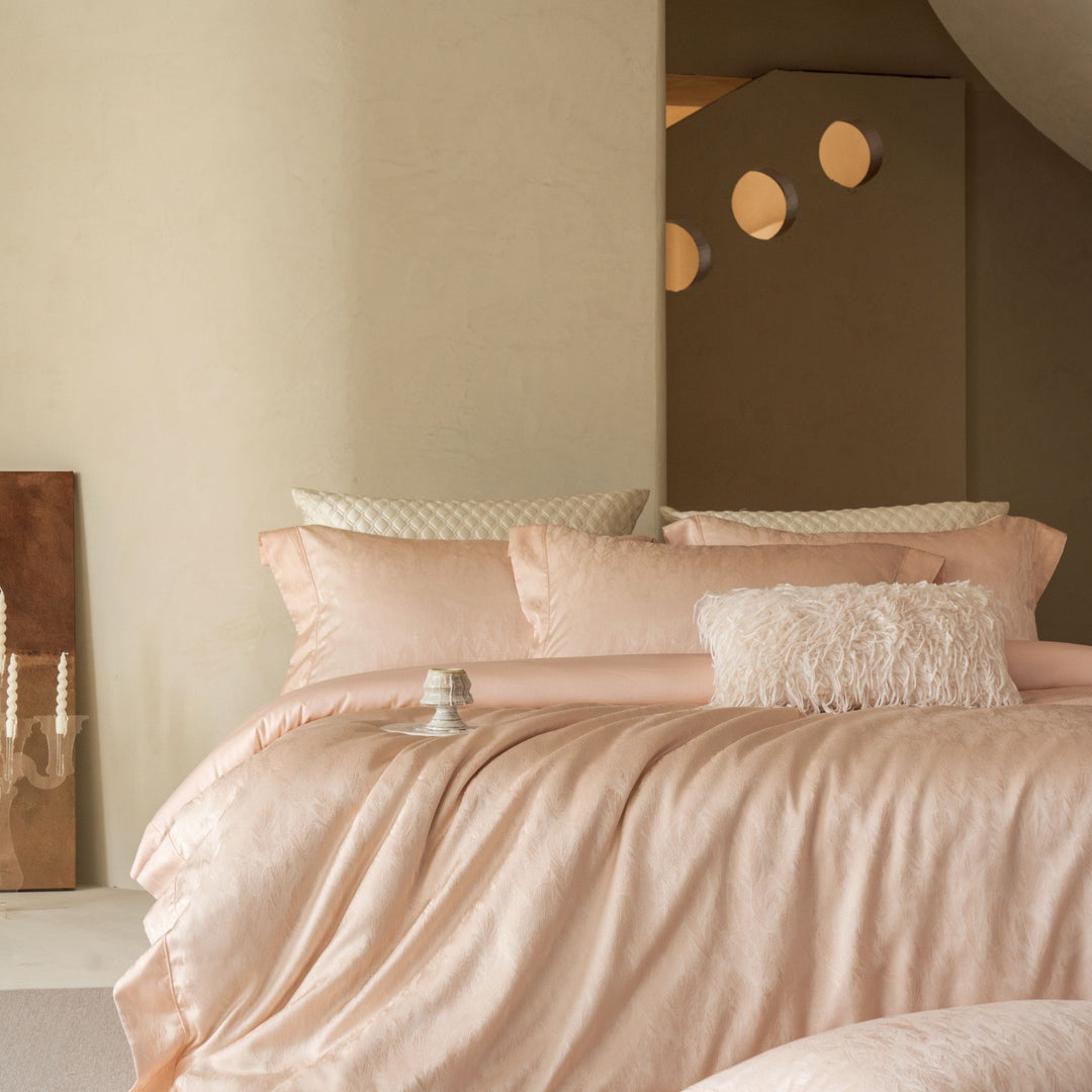 Luxurious satin bedding set with jacquard lace pattern and decorative pillow