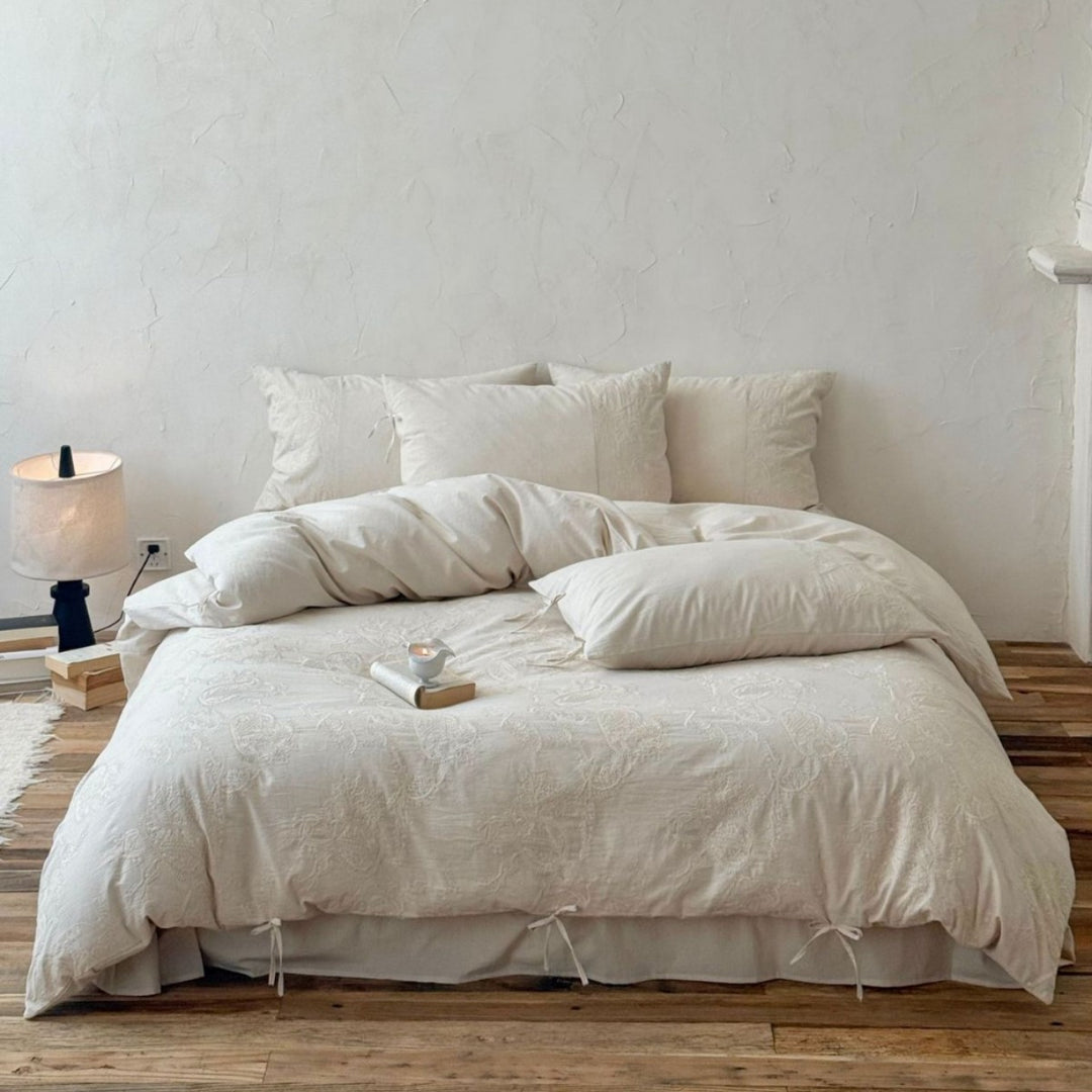 Luxurious cotton bedding set with embroidered paisley design and ties