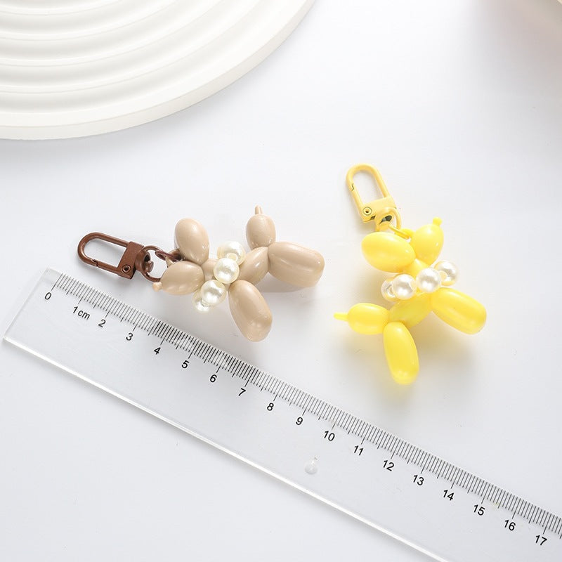 Playful keychain with balloon dog and beads Stornfield