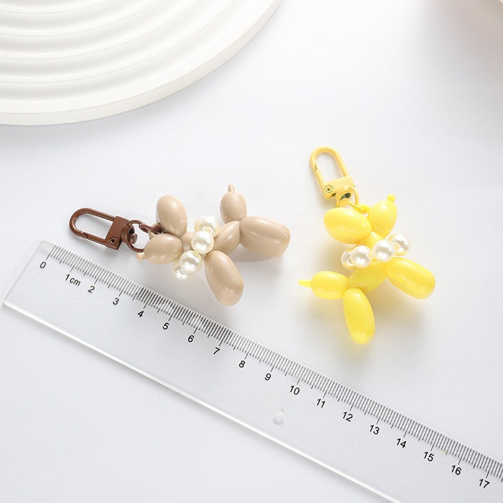 Playful keychain with balloon dog and beads Stornfield