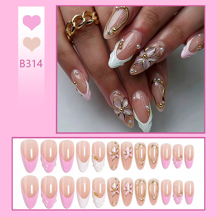 Artificial nail set with elegant floral designs and glamorous 3D applications Stornfield