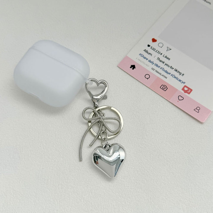 Heart-Shaped Metallic Keychain with Decorative Bow Stornfield