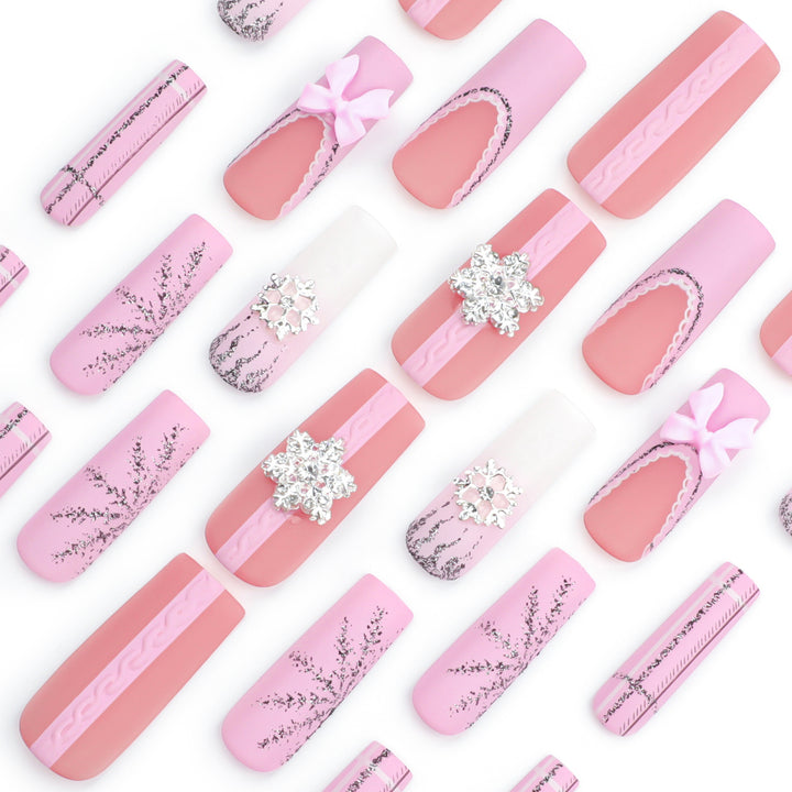 Artful nail extensions with festive decorations Stornfield