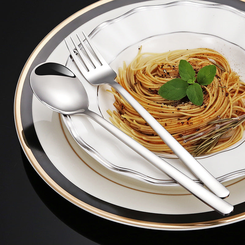 Elegant dessert spoon with luxurious golden surface Stornfield