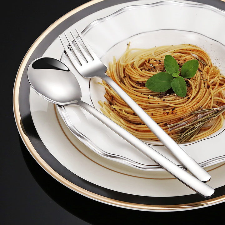 Elegant dessert spoon with luxurious golden surface Stornfield