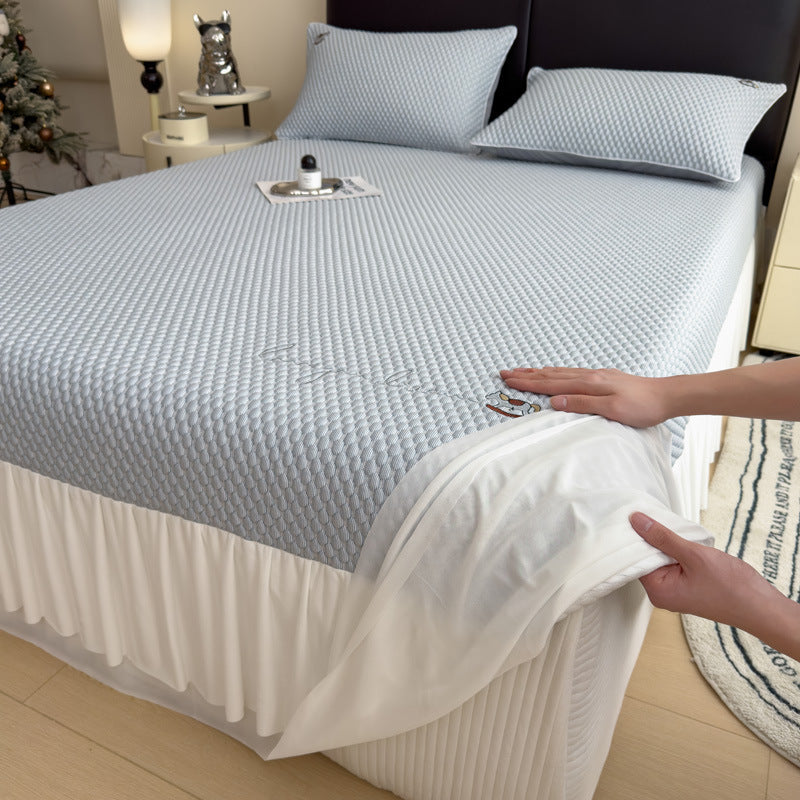 Quilted mattress protector with elastic all-around fit and panda embroidery