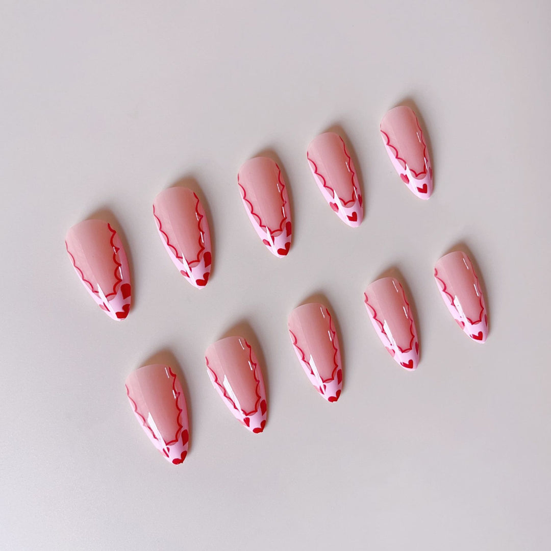 Acrylic nail set with elegant heart tips and creative accents Stornfield