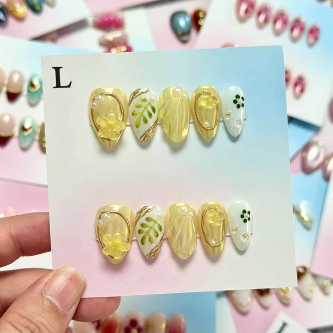 Decorative Press-On Nail Set with Floral and Gem Accents  1791774723