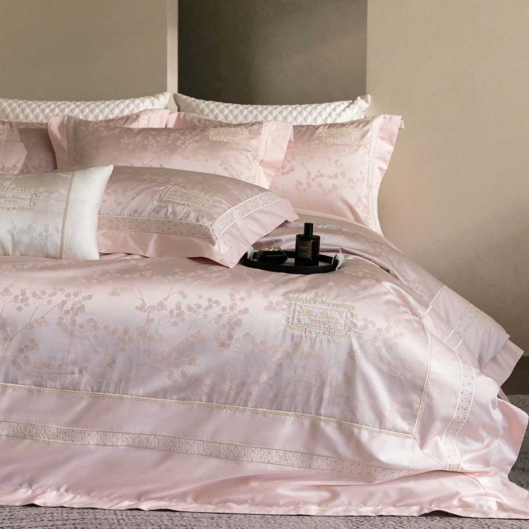 Luxurious satin bedding with jacquard floral pattern and lace trim