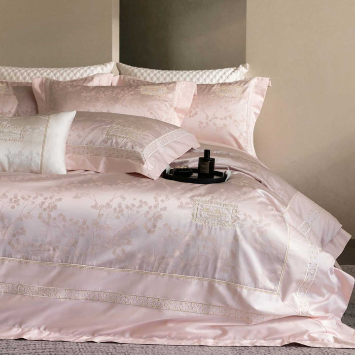 Luxurious satin bedding with jacquard floral pattern and lace trim