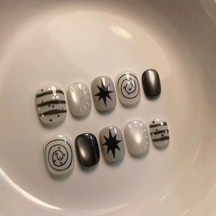 Artistic Press-On Nail Art Set with Celestial Designs