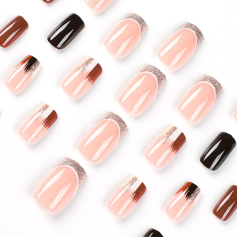 Elegant Artificial Nail Extensions with Ombre and Glitter Details Stornfield