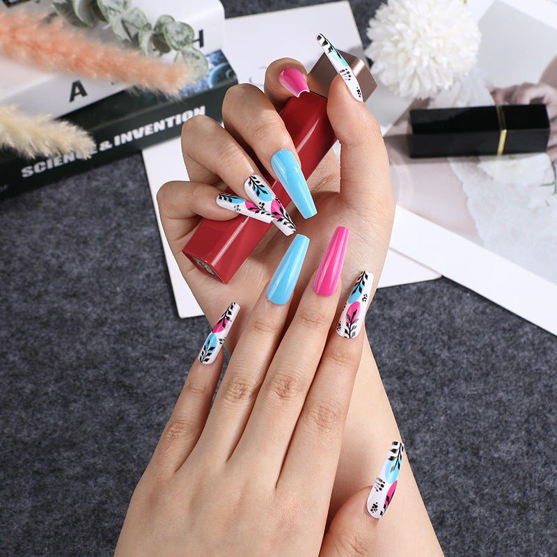Artificial nails with floral design and creative accents Stornfield