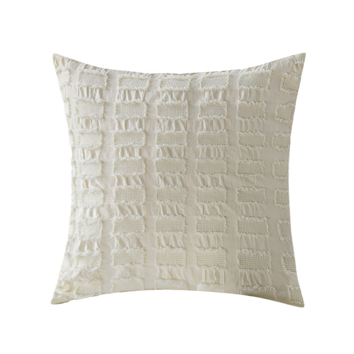 Square decorative pillow cover made of cotton blend with relief rectangular tufts and fringed edge Stornfield