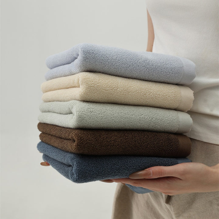 Luxury cotton terry towel set with logo border and extra soft Turquetto structure