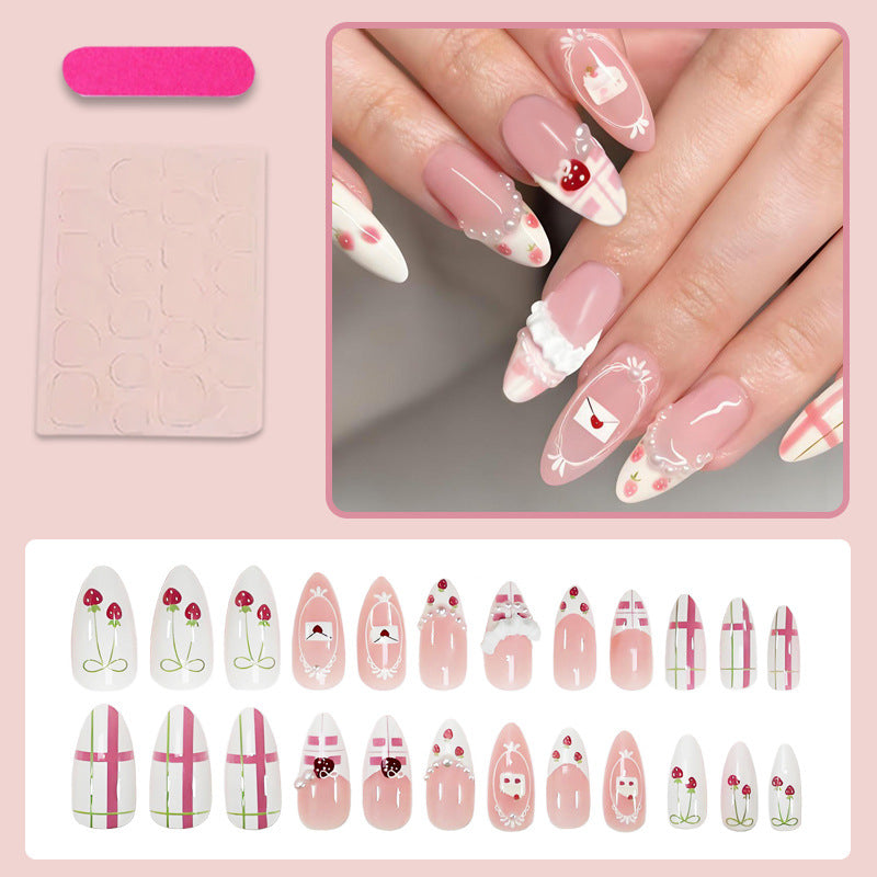 Artificial nail set with playful flowers and elaborate decorations Stornfield