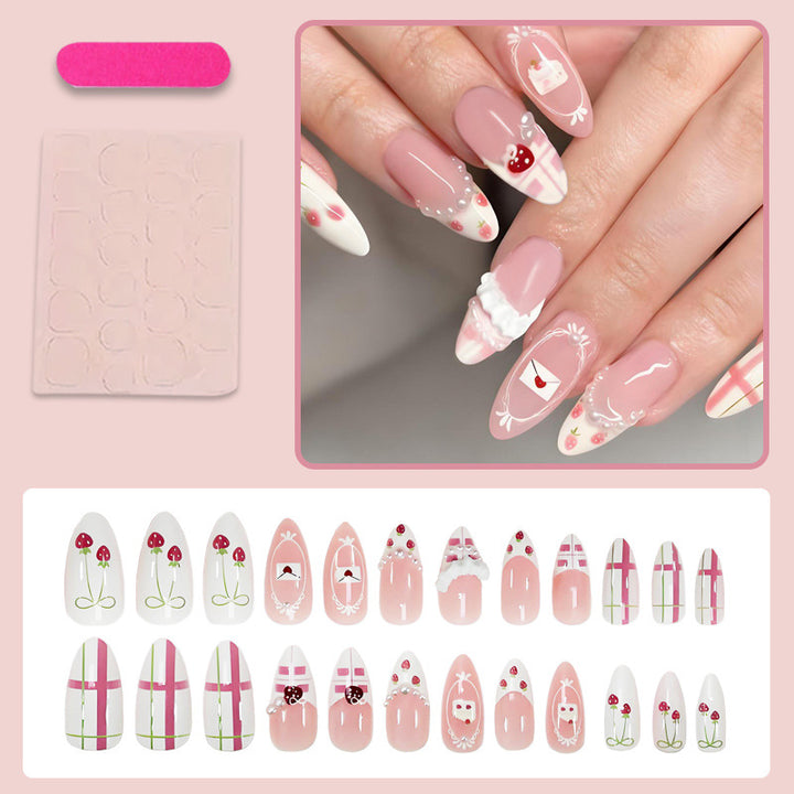 Artificial nail set with playful flowers and elaborate decorations Stornfield
