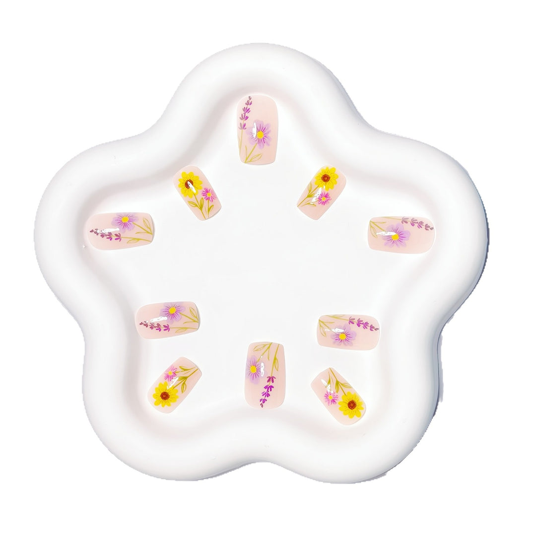Glittering artificial nails with floral patterns Stornfield