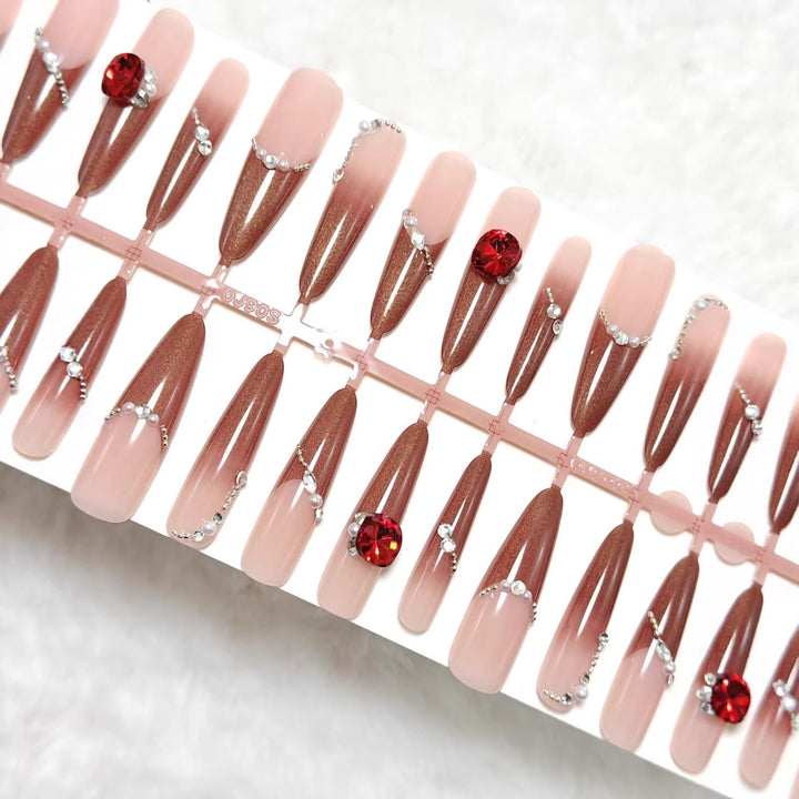 Artificial nails with luxurious 3D decorations and glamorous accents Stornfield