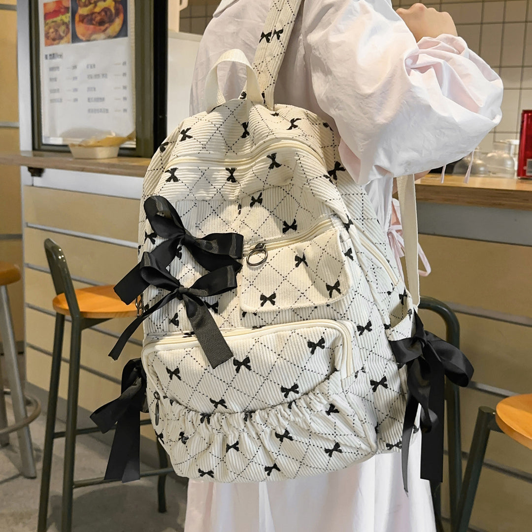 Playful backpack with bow details and practical compartments Stornfield