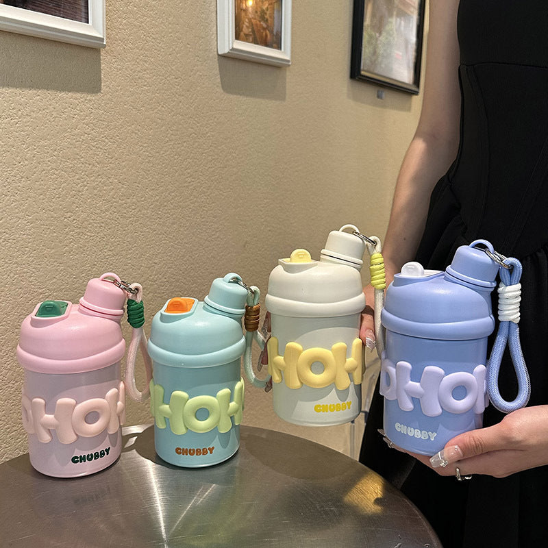 Ladies insulated water bottle with ergonomic carrying handle and cheerful design Stornfield