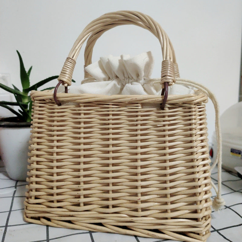 Women's handbag made of braided material with cotton drawstring closure Stornfield