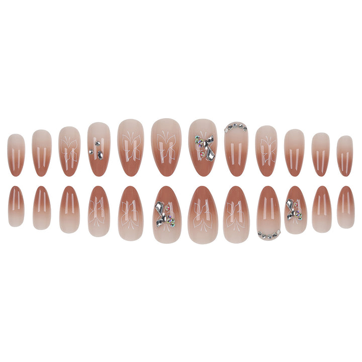 Elegant Stiletto Press-On Nails with Embellished Designs Stornfield
