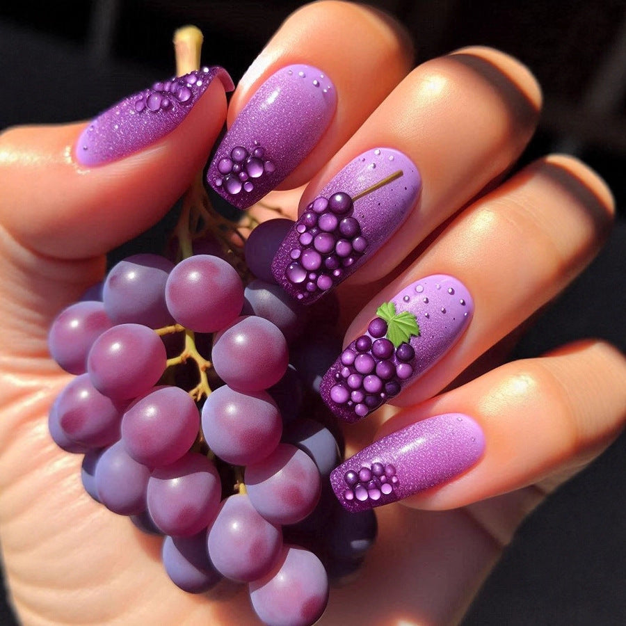 Artificial nails with detailed grape motifs Stornfield