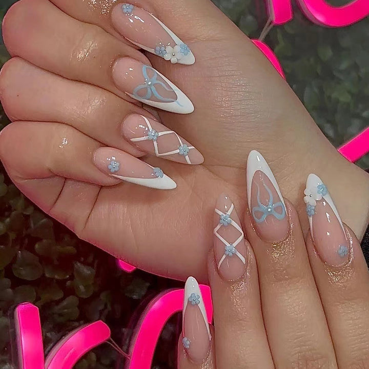 Acrylic nail set with elegant 3D flowers and glamorous accents Stornfield
